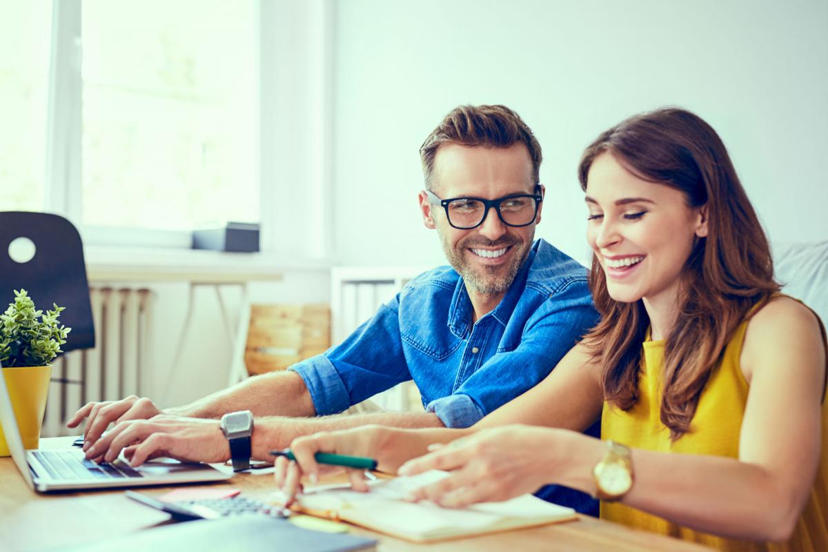Man and woman reviewing finances